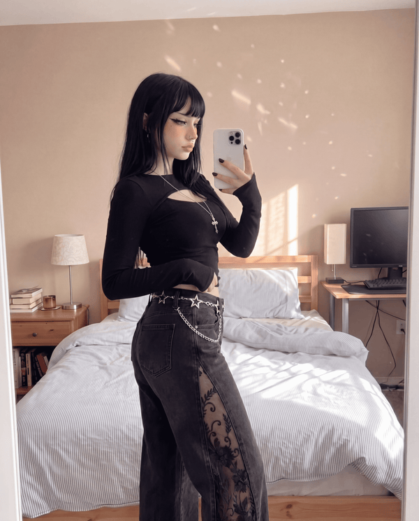 Gothic black lace panel jeans styled with a black top